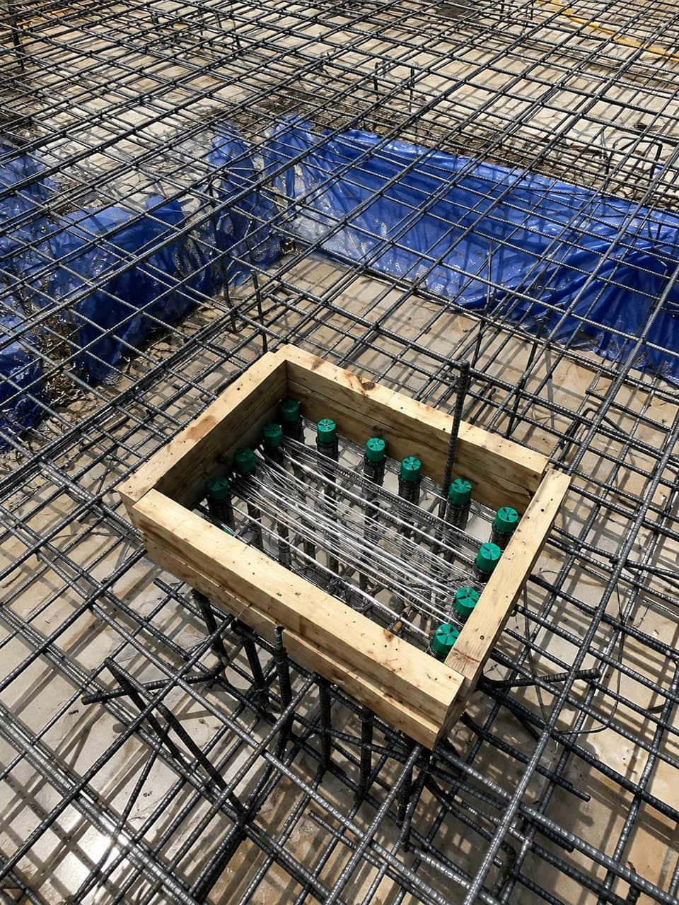 Starter bar template viewed from above within a reinforcement cage